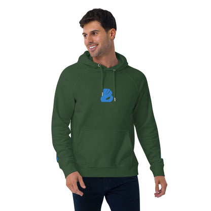 Man wearing Unisex Bio-Raglan-Hoodie N°3 in green with blue logo, showcasing comfortable and stylish unisex fashion