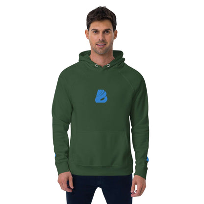 Model wearing Unisex Bio-Raglan-Hoodie N°3 in green with blue logo, showcasing comfortable eco-friendly fashion.