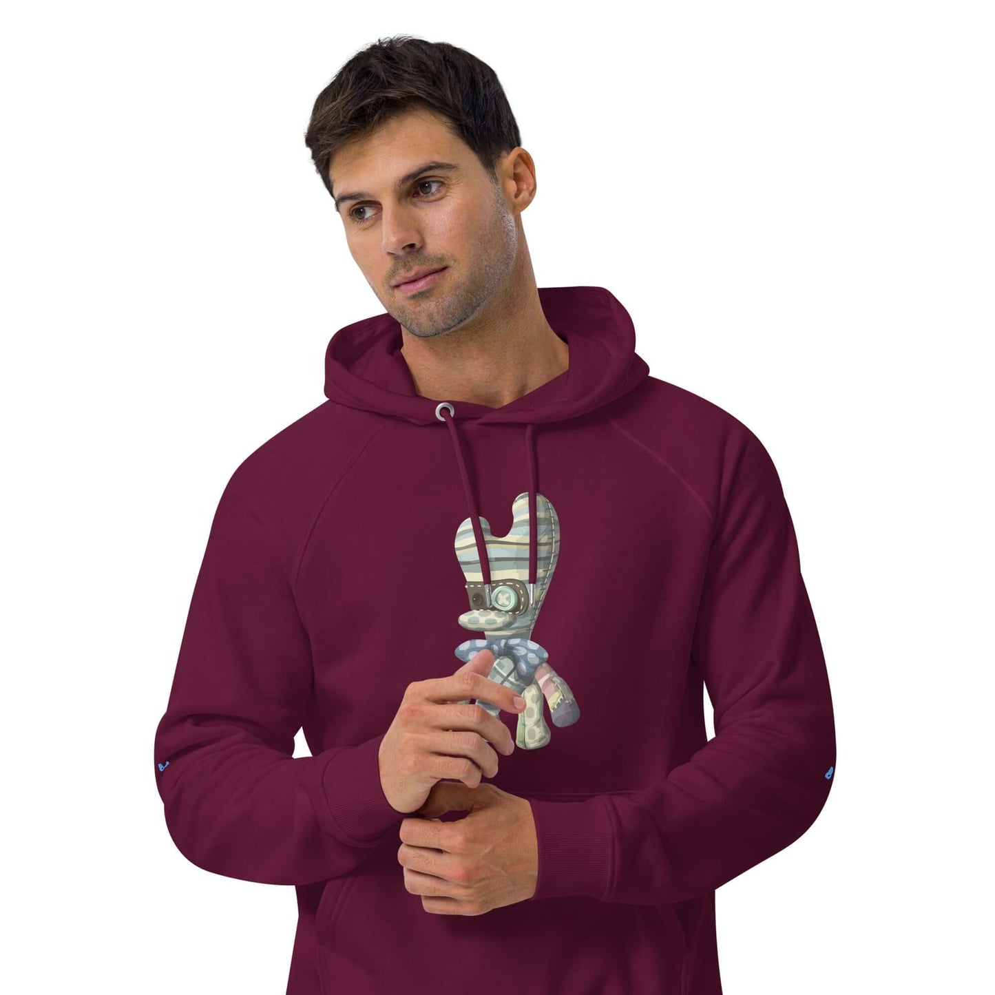Man wearing a burgundy Unisex Bio-Raglan-Hoodie with graphic print, displaying a casual and stylish look.