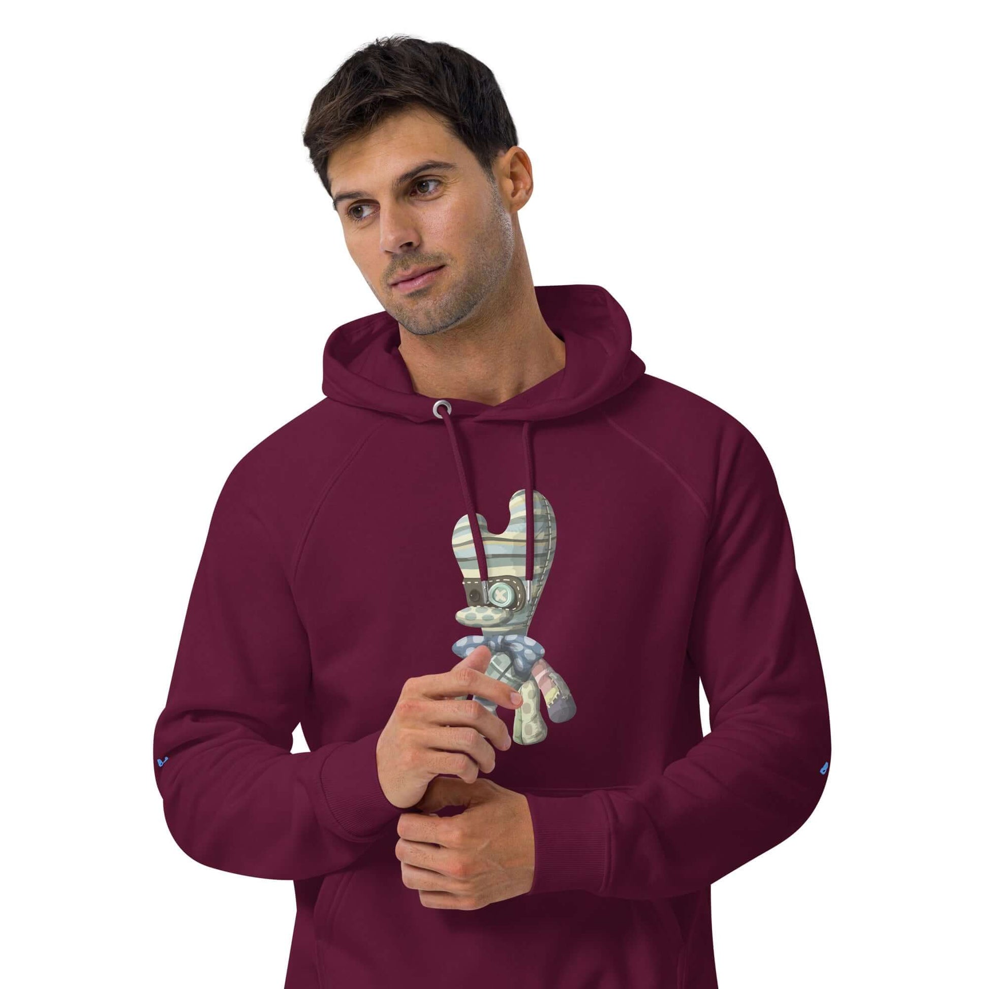 Man wearing a burgundy Unisex Bio-Raglan-Hoodie with graphic print, displaying a casual and stylish look.