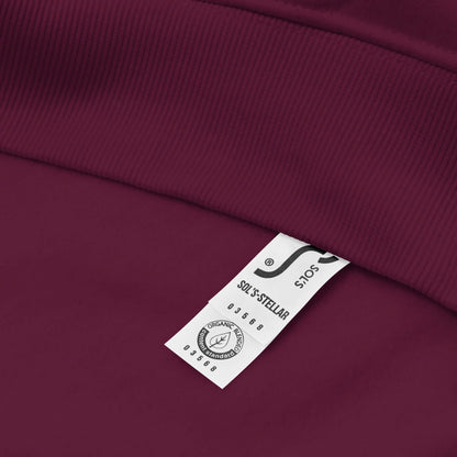 Label detail of Unisex Bio-Raglan-Hoodie showing fabric texture and stitching.