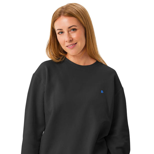 Leichter textilgefärbter Unisex-Fleece-Pullover mit Rundhalsausschnitt in Schwarz, ideal für einen lässigen, bequemen Look.