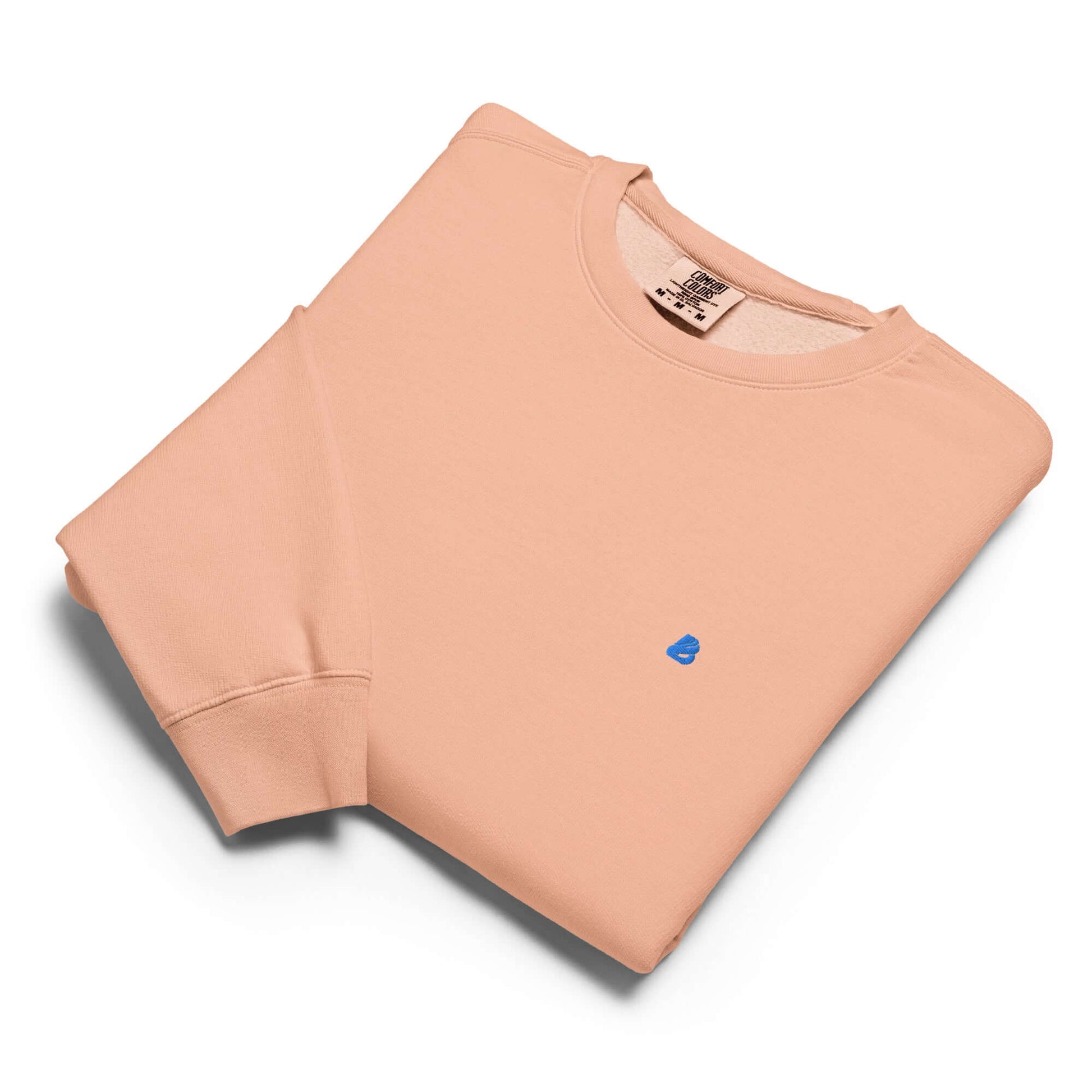 Leichter textilgefärbter Unisex-Fleece-Pullover mit Rundhalsausschnitt in Vintage-Optik, gefaltet auf weißem Hintergrund.