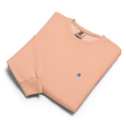 Leichter textilgefärbter Unisex-Fleece-Pullover mit Rundhalsausschnitt in Vintage-Optik, gefaltet auf weißem Hintergrund.