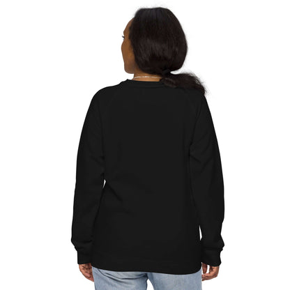Back view of person wearing Unisex Bio-Raglan-Pullover N°3 in black, comfort and style combined with soft fleece interior and cotton exterior.