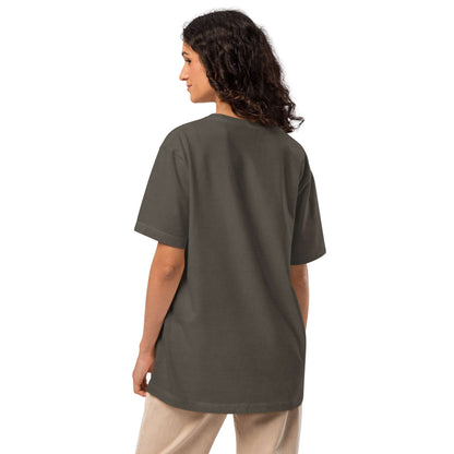 Back view of model wearing Oversized-Unisex-T-Shirt in vintage charcoal gray, showcasing relaxed fit and soft cotton texture.