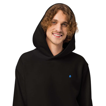 Schwerer Oversized Hoodie in black worn by model, featuring breathable cotton-polyester fleece, cozy and stylish for lounging.