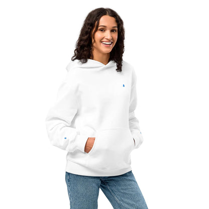 Smiling person wearing a weißer Schwerer Oversized Hoodie and jeans, showcasing comfort and style.