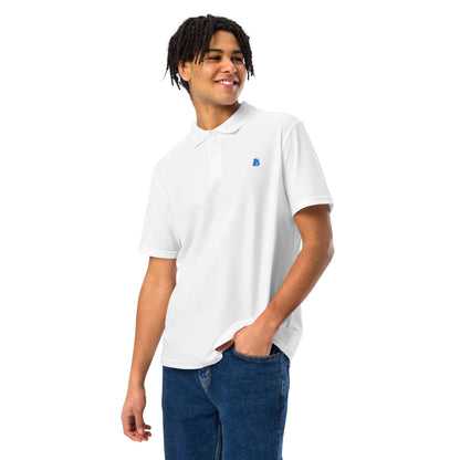 Unisex Piqué-Poloshirt N°0 in white, worn by model, showing classic fit and durable cotton fabric for versatile styling.