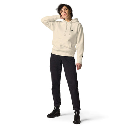 Person wearing Unisex-Kapuzenpullover N°49 with front pocket and hood, showcasing stylish streetwear design.