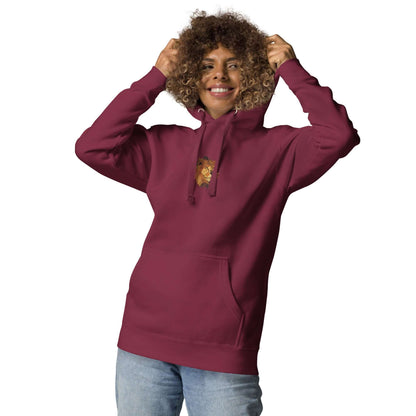 Person wearing Unisex-Kapuzenpullover N°48 in burgundy with a stylish design, featuring kangaroo pocket and a cozy hood.