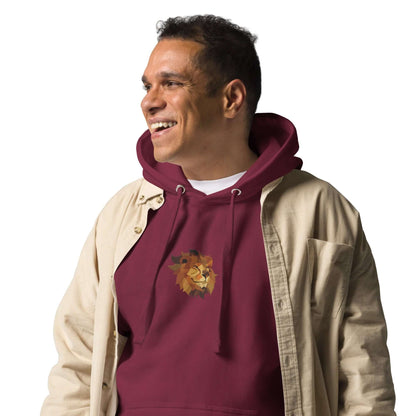 Man wearing Unisex-Kapuzenpullover N°48 with lion design, kangaroo pocket, and warm hood, in maroon color for streetwear fashion.