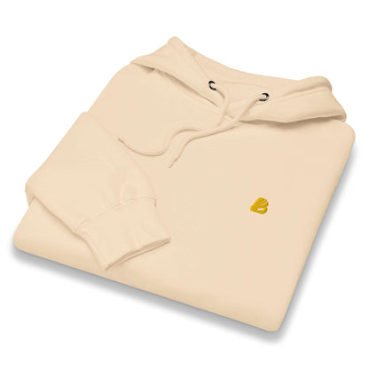 Mittelschwerer Unisex Premium-Hoodie in Beige, faltig auf weißem Hintergrund, mit modernem Design und bequemem Baumwoll-Polyester-Mix.