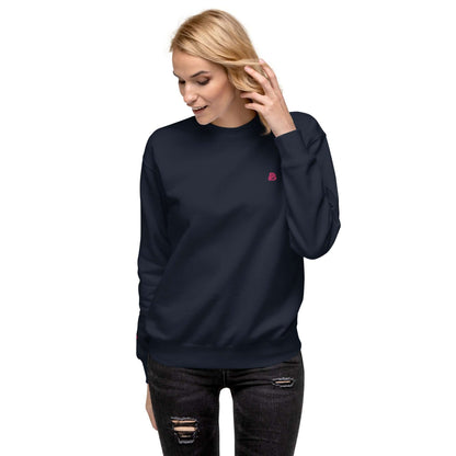 Woman wearing Unisex-Premium-Pullover N°1, showcasing ribbed crew neckline and soft fleece interior for a trendy streetwear look.