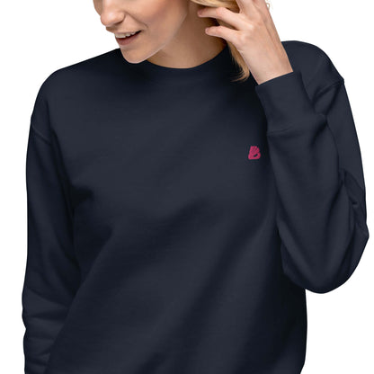 Woman wearing Unisex-Premium-Pullover N°1, black, classic sweatshirt with ribbed crew neck, long cuffs, soft fleece inside, casual look