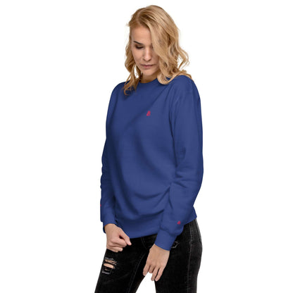 Unisex-Premium-Pullover N°1 worn by model in blue, featuring ribbed crew neckline and cuffs for a casual streetwear look.