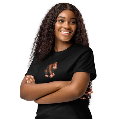 Woman wearing a black DryBlend® T-Shirt with colorful print, featuring modern and classic fit, made of 50% cotton and 50% polyester for workouts