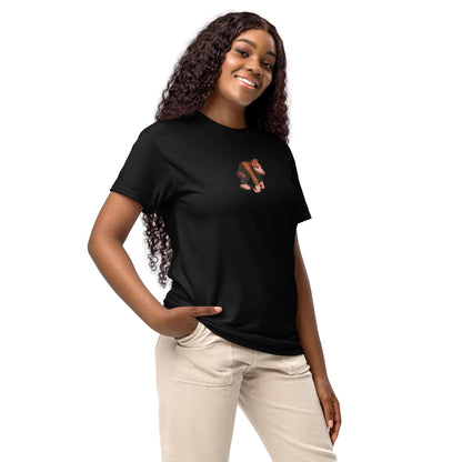 Woman wearing a DryBlend® T-Shirt in black with a stylish design, showcasing modern fit and moisture-wicking fabric.