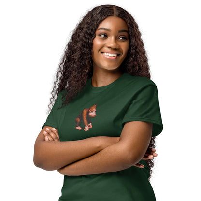 Woman wearing a green DryBlend® T-Shirt featuring an embroidered character, showcasing a comfortable and stylish modern fit.