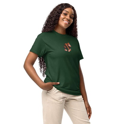 Smiling woman wearing a green DryBlend® T-Shirt with floral design, showcasing modern fit and moisture-wicking fabric.
