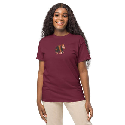 Woman wearing maroon DryBlend® T-Shirt with bear graphic, showcasing modern fit and moisture-wicking fabric.