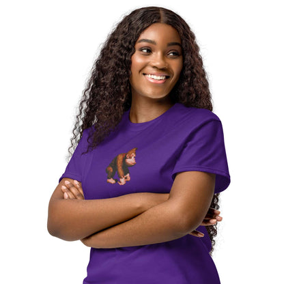 Woman smiling in a purple T-shirt featuring a cartoon character from a popular video game.