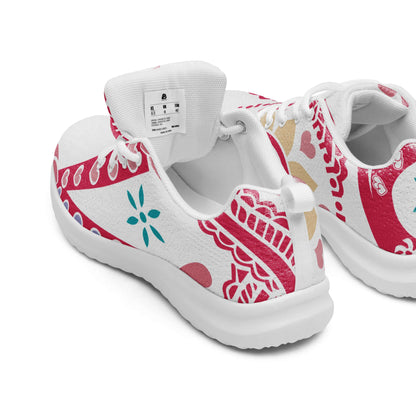 Damen-Turnschuhe N°2 mit atmungsaktivem Flyknit-Material und farbenfrohem, floralem Muster, ideal für Sport und Freizeit.