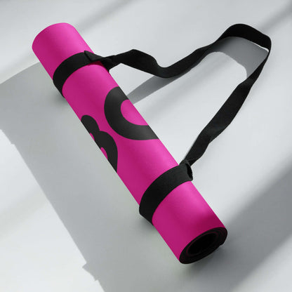 Pink Yoga-Matte N°1 with straps, rolled and ready for easy carry, featuring non-slip rubber base and soft Microsuede top.