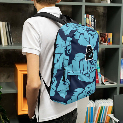 Person wearing Rucksack N°4 with a fashionable blue floral design, ideal for daily use or sports activities, displayed in a stylish setting.