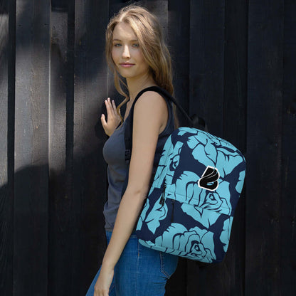 Woman wearing floral Rucksack N°4, ideal for daily use or sports, featuring spacious compartments and weather-resistant material.