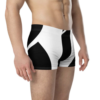 Model wearing Boxer-Briefs N°0 made from stretchy material with mid-waist fit, featuring lined front for comfort and support.