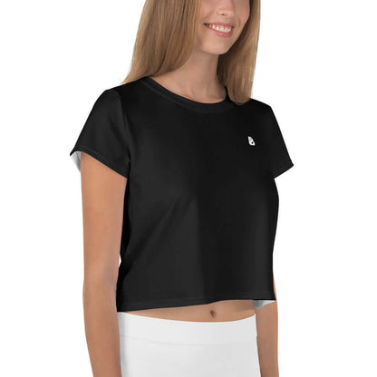 Woman wearing black Allover-Crop-T-Shirt N°2 with a smile