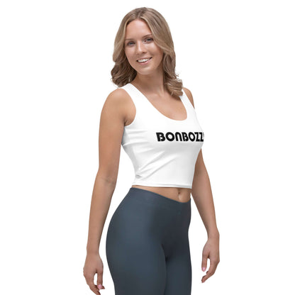 Woman wearing Crop-Top N°0 in white, figure-hugging design with full print, showcasing stylish comfort and flexibility.