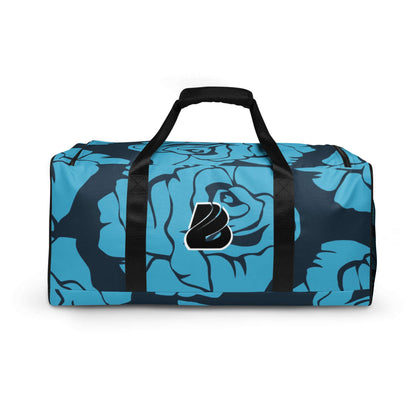 Blue floral Weekender N°19 bag with adjustable shoulder straps and ample compartments for travel and gym use.