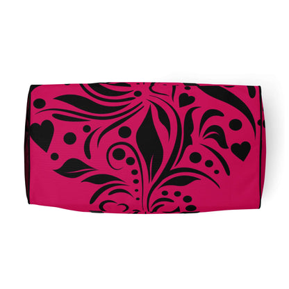 Pink Weekender N°15 with black floral design, versatile travel or gym bag with ample storage and adjustable padded shoulder straps.