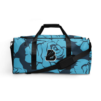 Weekender N°19 with blue floral design and adjustable straps, perfect for travel and gym, featuring zipper pockets for valuables.