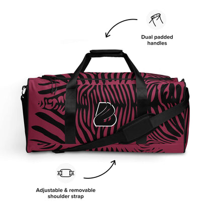 Weekender N°23 bag with zebra print design, dual padded handles, and adjustable shoulder strap.