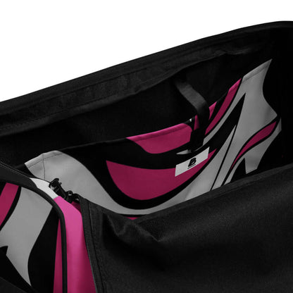 Interior view of Weekender N°7 bag with pink and black abstract pattern, showcasing spacious compartments and zipper pocket.