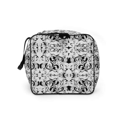 Weekender N°9 with ornate black and white pattern, ideal for travel, errands, or gym, featuring multiple pockets and adjustable shoulder straps.