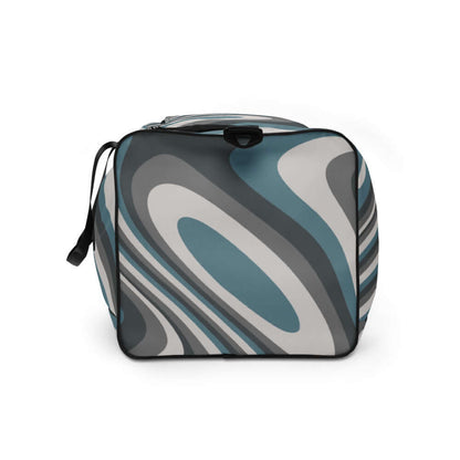 Weekender N°10 stylish travel bag with abstract blue and gray patterns, spacious design, and adjustable shoulder straps for versatile use.