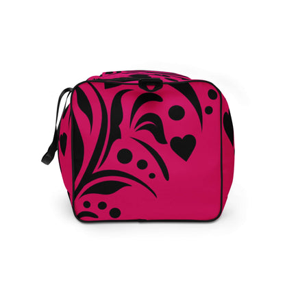 Pink and black patterned bag, ideal for travel, errands, or gym use. Weekender N°15 with adjustable padded shoulder straps for comfort.