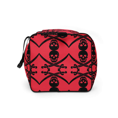 Red skull and crossbones patterned bag with a cube shape and black handle.