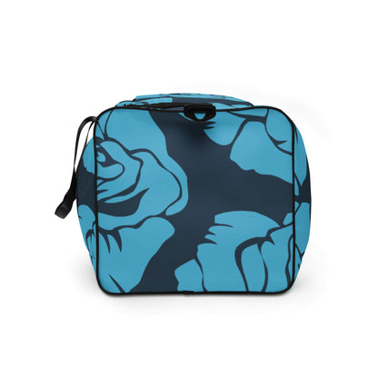 Weekender N°19 bag with blue floral pattern, ideal for travel and daily use, featuring adjustable padded shoulder straps and zip pocket.