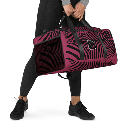 Weekender N°23 stylish travel bag with zebra print, perfect for gym, travel, and daily use, featuring adjustable shoulder straps.