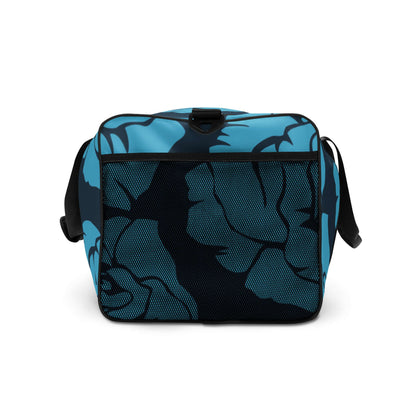 Weekender N°19 stylish blue floral travel bag with adjustable padded shoulder straps and multiple compartments for easy organization.