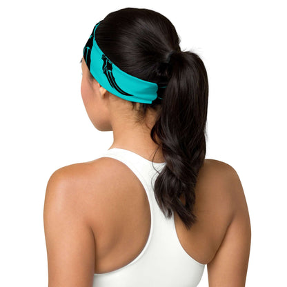 Woman wearing Stirnband N°1 in turquoise, showing back view with braided hair, perfect for stylish workout or casual wear.