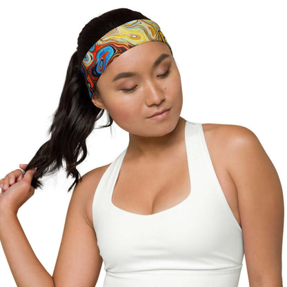 Woman wearing colorful Stirnband N°0, perfect for workout and stylish evening look, made of polyester and elastane, one size.