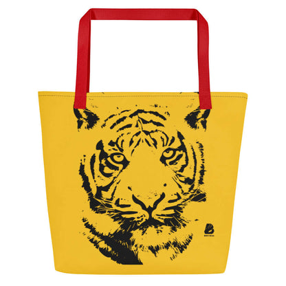 Großer Stoffbeutel N°0 with a vivid tiger print, perfect for the beach. Yellow polyester bag with red handles and heavy-duty design.
