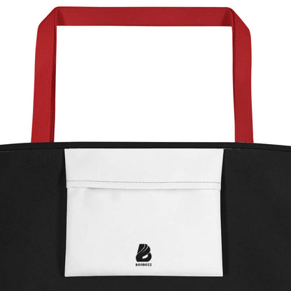 Strandtasche N°0 with red cotton handles, featuring a large inner pocket, durable polyester material, and vibrant colors.