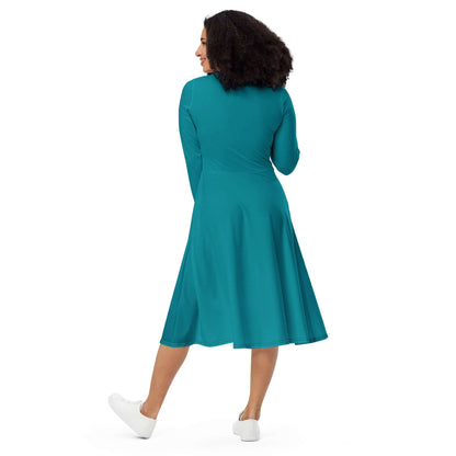 Woman wearing Langärmliges Midikleid mit Allover-Druck N°3, showcasing the back, soft fabric and flattering cut with pockets.